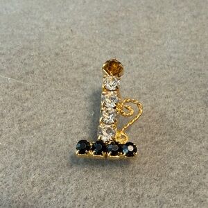 Elegant Gold and Black Crystal Brooch